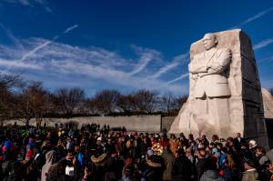 A large group gathers to watch a wreath-laying ceremony at the Martin Luther King Jr. Memorial on Martin Luther King Jr. Day in Washington, Monday, Jan. 16, 2023. (AP Photo / Andrew Harnik)