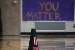 Friday night's basketball game was the second annual Take a Timeout to Talk - Suicide Prevention Awareness game. Coaches and players donned purple and Juneau School District Superintendent Bridget Weiss spoke at halftime about the importance of mental health and suicide awareness.