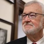 Alaska Senate President Gary Stevens, R-Kodiak, stands near his portrait in a hallway of the Alaska State Capitol. On the first day of the legislative session, Stevens, who will preside over a body with a bipartisan majority, spoke about the importance of cooperation. (Clarise Larson / Juneau Empire)