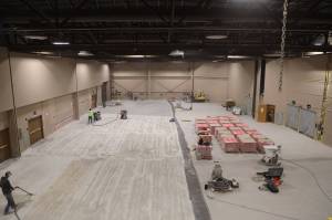 Clarise Larson / Juneau Empire
A handful of workers clean the floors of the Centennial Hall ballroom Wednesday evening as renovations continue. According to projects manager, the renovation are expected to be completed in early August.