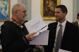 Mark Sabbatini / Juneau Empire
State Senate Finance Committee Chair Bert Stedman, R-Sitka, left, discusses the states revenue forecast following a presentation of the report Friday at the Alaska State Capitol.
