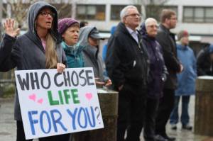 Jonson Kuhn / Juneau Empire 
Shannen Greene holds a sign at the Alaska State Capitol during Mondays anti-abortion rally held by Alaskans for Life Inc.