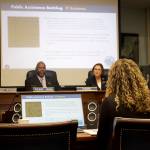 Alaska Department of Health Commissioner Heidi Hedberg explains why there is a major backlog of food stamp and Medicaid applications to the Senate Health And Resources Committee on Tuesday at the Alaska State Capitol. Part of the reason, shown on the slide during her presentation, is a computer system that uses 1959 technology and only one employee is currently qualified to program. (Mark Sabbatini / Juneau Empire)