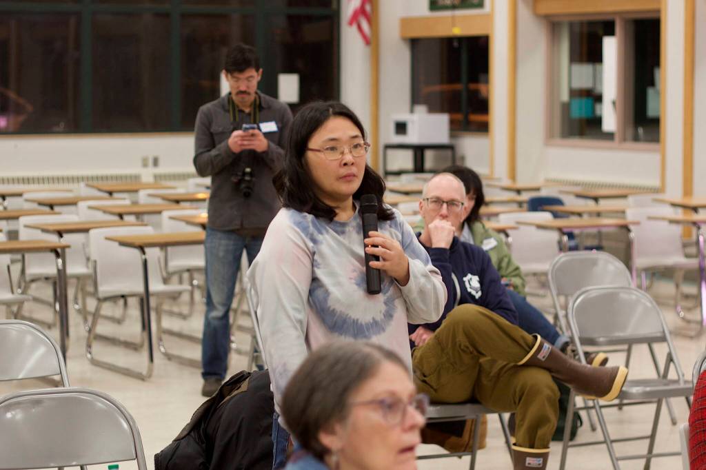 Katie Botz address Juneaus legislative delegation during a town hall on Jan. 11 at Dzantiki Heeni Middle School. (Mark Sabbatini / Juneau Empire)