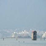 Smoke and haze fill the air to filter the view of downtown Juneau from Douglas Island on Friday, July 5, 2019. (Michael Penn | Juneau Empire)