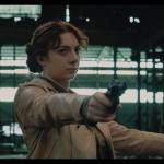 Corinne Britti as Leyna Rahn holds hostages at gunpoint in Condors Nest. (Courtesy Photo / PMKBNC)