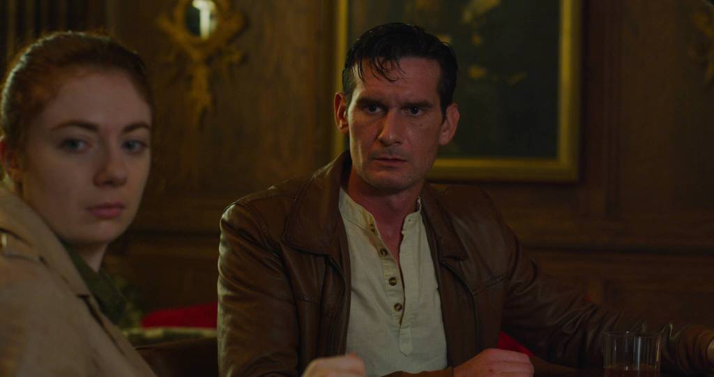 Jacob Keohane as the films lead Will Spalding alongside costar Corinne Britti as Leyna Rahn in the World War II thriller/action Condors Nest. (Courtesy Photo / PMKBNC)