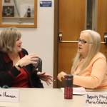 Mark Sabbatini / Juneau Empire 
State Rep. Sara Hannan, left, and Juneau Deputy Mayor Maria Gladziszewski discuss overlapping local issues following a joint meeting of the Juneau Assembly and local state legislative delegation Thursday morning.