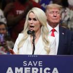 U.S. Senate candidate Kelly Tshibaka and former President Donald Trump stand on stage during a July 2022 rally in Anchorage. (Mark Sabbatini / Juneau Empire File)