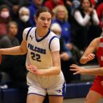 TMHS sophomore Kerra Baxter (22) dribbles while surveying the court during a loss to Wasilla. (Ben Hohenstatt / Juneau Empire)