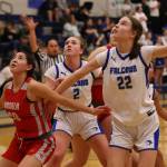 Wasilla's Katie Jackson (30) jockeys for position with TMHS' Ashlyn Gates (2) and Kerra Baxter (22). (Ben Hohenstatt / Juneau Empire)