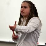 Rachel Wood pantomimes launching a rocket near the end of Ian McWethys Bad Auditions by Bad Actors during the humorous interpretation final. (Ben Hohenstatt / Juneau Empire)