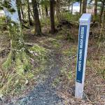 Lauren Cusimano / For the Juneau Empire 
This photo shows the Favorite Channel Beach Access walk with a new trail marker.