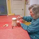 Courtesy Photo / King family 
Mary Lou King weaves at the kitchen table in her home.