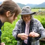 Courtesy Photo / King family 
Mary Lou King shows her granddaughter how to split spruce roots.