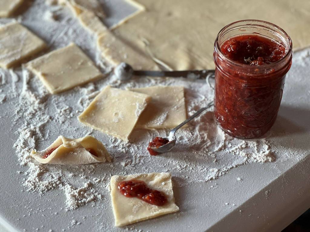 Courtesy Photo / Vivian Faith Prescott 
Making bow tie cookies with salmonberry jam.