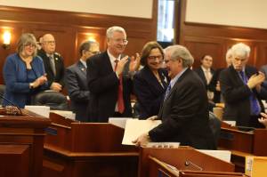 Alaska Supreme Court Chief Justice Daniel Winfree gets a standing ovation from the Alaska State Legislature as he enters the House chamber Wednesday to deliver his final State of the Judiciary speech. Winfree is stepping down next Monday when he reaches the mandatory retirement age of 70. (Mark Sabbatini / Juneau Empire)