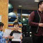 Clarise Larson / Juneau Empire 
Ayuq Blanchett and Josaia Lehauli recieve awards for their work at the Tlingit Culture Language and Literacy program at Harborview Elementary School Monday morning.