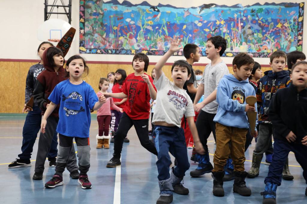 Students from the Tlingit Culture Language and Literacy program at Harborview Elementary School dance in front of elders during the programs Monday morning meeting. (Clarise Larson / Juneau Empire)
Students from the Tlingit Culture Language and Literacy program at Harborview Elementary School dance in front of elders during the programs Monday morning meeting. (Clarise Larson / Juneau Empire)