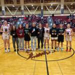 Courtesy Photo / Tanya Nizich 
JDHS senior Skylar Tuckwood (middle) earns all-tournament honors on Saturday at the conclusion of the Dimond Tournament in Anchorage.