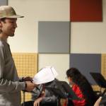 Jared Olin directs the cast of Vera Starbards adaptation The Beginning of Eagle on Wednesday night from KTOO Studios. Olin also acts in Starbards latest works, which will be performed live in-person and on-air at KTOO Radio Station on Saturday as part of the Alaska Theater Festival: Radio Plays. (Jonson Kuhn / Juneau Empire)