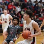 JDHS senior Orion Dybdahl comes in for a lay up during the second conference game at home against Ketchikan High School on Saturday night. Dybdahl led his team in scores for a total of 23 points. (Jonson Kuhn / Juneau Empire)