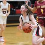 JDHS freshman Gwen Nizich drives the lane for a 2-point shot on Saturday in the second game against Mt. Edgecumbe at home. Nizich finished with a total of 11 points. (Jonson Kuhn / Juneau Empire)