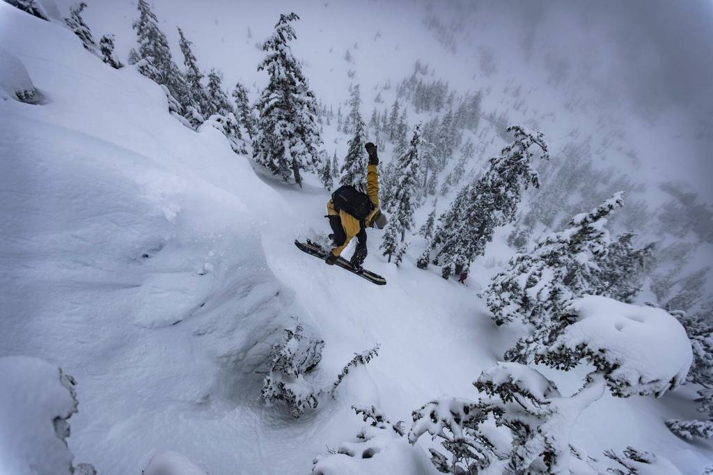 Mark Rainery riding backcountry trails of Southeast as part of his latest collaborative snowboarding film, The Outliers, which premiered on Feb. 11 at the Hangar Ballroom in Juneau. (Courtesy Photo / Scott Baxter)