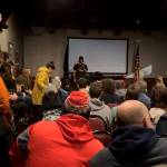 Mark Rainery addresses sold out crowd at the Hangar Ballroom on Feb. 11 for the premiere of his latest collaborative snowboarding film, The Outliers. (Courtesy Photo / Kenzie Shultz)