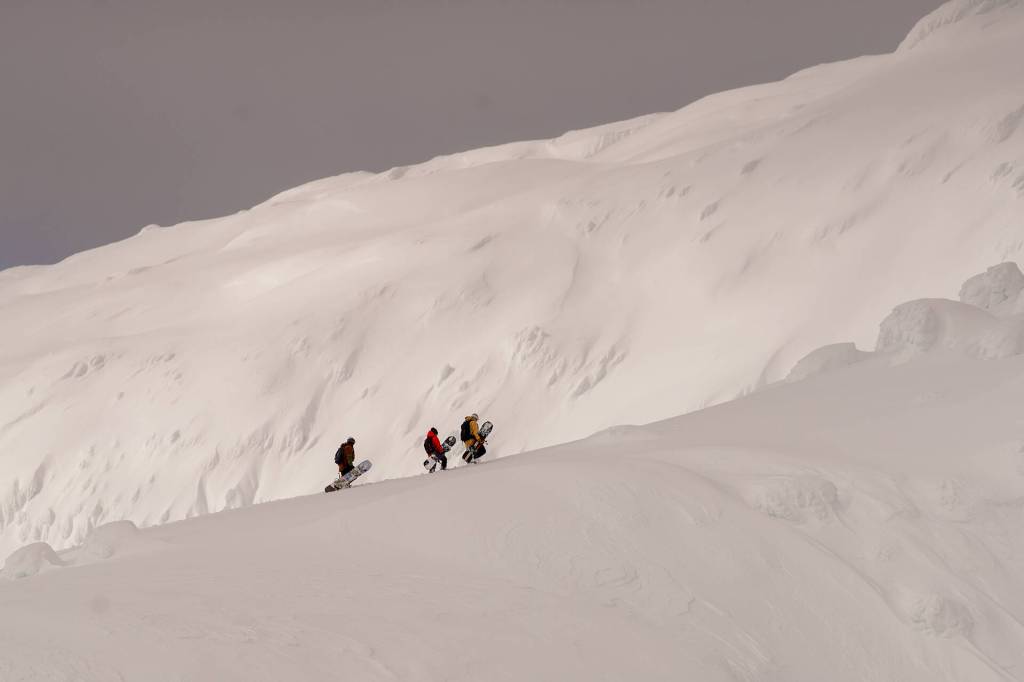 A still image of Mark Rainery and crew hiking backcountry trails of Southeast Alaska as part of their collaborative new film, The Outliers. (Courtesy Photo / Scott Baxter)