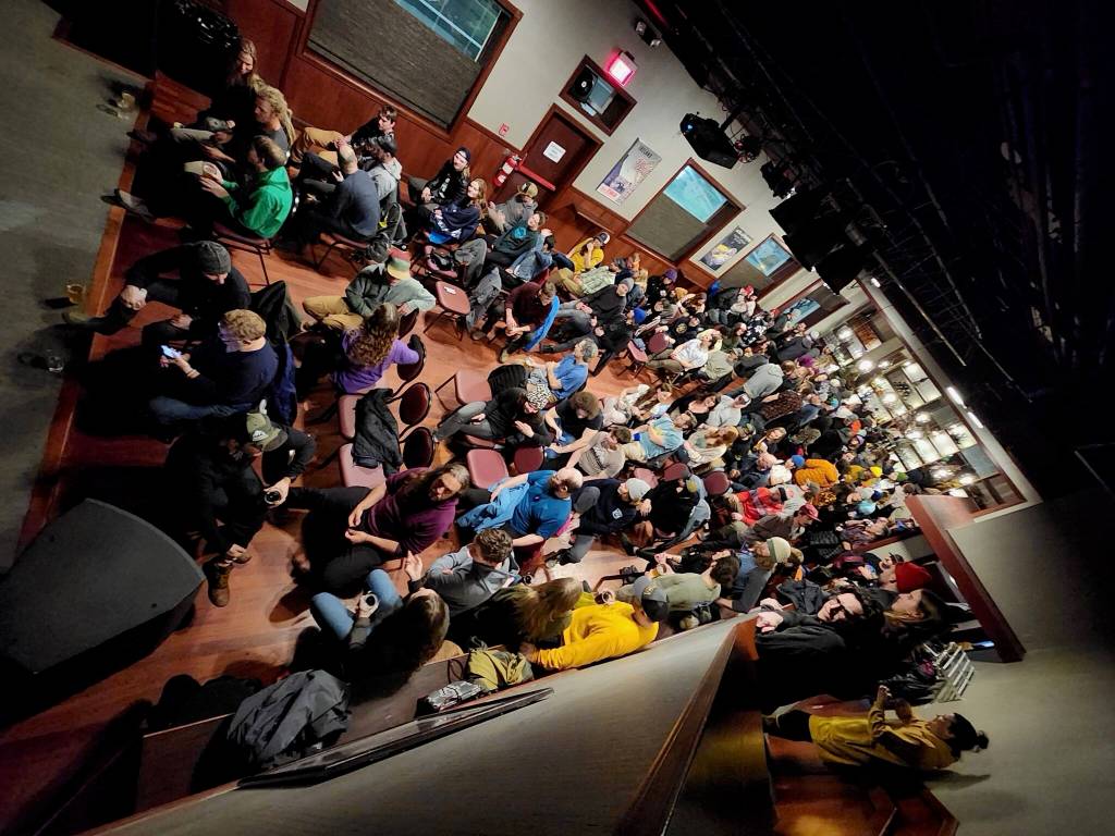 A sold out audience at the Hangar Ballroom for the premiere of Mark Rainery and friends latest collaborative film, The Outliers. The film premiered on Feb. 11 with two showings, both of which saw packed houses. (Courtesy Photo / Kenzie Schultz)
