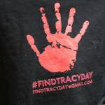 Clarise Larson / Juneau Empire 
Kaelyn Schneider holds a sweatshirt featuring a red hand, a symbol of the Missing Murdered Indigenous Women movement, along with an email tag where people can send information regarding the disappearance her mother Tracy Lynn Day, who has been missing since Feb. 14 2019.