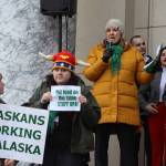 Heidi Drygas, executive director of the 8,000-member Alaska State Employees Association, addresses a rally outside the Alaska State Capitol on Friday where participants protested the workforce shortage facing various agencies including the state Division of Public Assistance. Drygas on Tuesday gave qualified support to an order by Gov. Mike Dunleavy eliminating the four-year degree requirement for most state jobs, stating it is a small part of a big issue involving poor wages, benefits and morale among employees. (Mark Sabbatini / Juneau Empire)