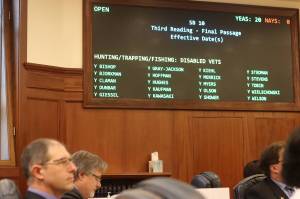 The Alaska State Senate unanimously passes its first bill of the current legislative session Wednesday, sponsored by state Sen. Jesse Kiehl, D-Juneau, lower left. The bill makes disabled military veterans residing in Alaska eligible for free trapping licenses in addition to hunting and fishing, and makes free service-related licenses for all three activities permanent instead of annual. (Mark Sabbatini / Juneau Empire)