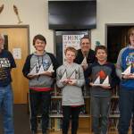 Doug Murray, Former SE MC Coordinator, next to FDMS mathcounts team. From left to right, Caden Morris, Liam Kiessling, Alan Degener (FDMS coach), Dan Degener and Tyler Oudekerk. (Courtesy Photo / Sheila Degener)