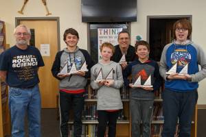 Doug Murray, Former SE MC Coordinator, next to FDMS mathcounts team. From left to right, Caden Morris, Liam Kiessling, Alan Degener (FDMS coach), Dan Degener and Tyler Oudekerk. (Courtesy Photo / Sheila Degener)