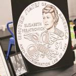 The design for the gold $1 Elizabeth Peratrovich coin was on display during the Elizabeth Peratrovich Day celebration at the Tlingit and Haida Community Council on Feb. 16, 2020. (Michael S. Lockett / Juneau Empire File)
