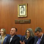 Guests in the Elizabeth Peratrovich Gallery in the House chambers at the Alaska State Capitol check messages and watch legislators arrive for Wednesdays floor session. The gallery is one of two in the House chambers named after famous Alaskans. (Mark Sabbatini/ Juneau Empire)
