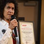 Dr. Emily Kane, CBJ Commission on Aging chair who was a part of the effort to join the network, gives a speech at AARP Alaskas Valentines Day-themed event Tuesday evening to celebrate Juneaus older adult population along with the citys recent commitment to ​​AARPs Network of Age-Friendly States and Communities. (Clarise Larson / Juneau Empire)