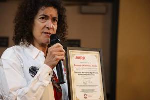 Dr. Emily Kane, CBJ Commission on Aging chair who was a part of the effort to join the network, gives a speech at AARP Alaskas Valentines Day-themed event Tuesday evening to celebrate Juneaus older adult population along with the citys recent commitment to ​​AARPs Network of Age-Friendly States and Communities. (Clarise Larson / Juneau Empire)