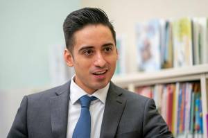 Anchorage School District superintendent Dr. Jharrett Bryantt speaks with a reporter in the library at Denali Montessori Elementary School on Wednesday, Aug. 17, 2022 in Anchorage, Alaska.  Alaska’s largest school district repeatedly and inappropriately secluded and restrained students with disabilities, the U.S. Department of Justice said Thursday following an investigation into alleged violations of the Americans with Disabilities Act.   (Loren Holmes / Anchorage Daily News)