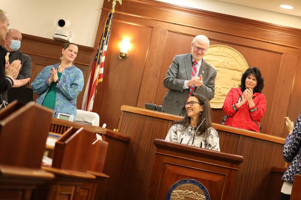 U.S. Rep. Mary Peltola gets a standing ovation from presiding legislative leaders and staff following her speech Friday to a joint session of the Alaska State Legislature. The 16-minute address was far shorter than speeches by other Alaska congressional members and governors in recent memory, but she also spent a comparable amount of time answer questions from legislators. (Clarise Larson / Juneau Empire)