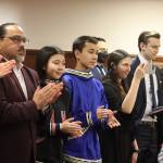 Family and staff of U.S. Rep. Mary Peltola stand and applaud as she enters the House chambers Friday to deliver her speech to a joint session of the Alaska State Legislature. Two of her children are currently high school students in Juneau. (Mark Sabbatini / Juneau Empire)