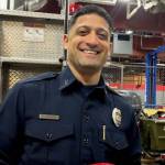 CCFR Captain Cheyenne Sanchez poses for a photo on Wednesday during his promotional ceremony where his badge was pinned by friends and family. (Courtesy Photo / CCFR)