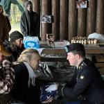 Lavena Sargent is presented a flag during her late husbands memorial service on Saturday at Auke Bay Recreation Area. Daniel was a Vietnam Veteran and had been retired from the Alaska Marine Highway System for 20 years. (Jonson Kuhn / Juneau Empire)