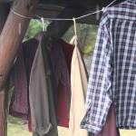 Daniel Sargents flannels blow in the breeze on Saturday during a special memorial service held in his honor at Raven Shelter. Guests were invited to take home one of Daniels shirts as a way of both remembering and honoring him. (Jonson Kuhn / Juneau Empire)