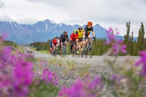 Racers from the Kluane Chilkat International Bike Relay head south on the Haines Highway during the first leg of the race the last time it was held on June 15, 2019. Organizers have announced the 2023 race is planned to go ahead on June 17, with registration opening March 15. (Yukon News file)