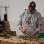 Southeast Alaska Food Bank director Chris Schapp separates cans of salmon on Monday donated by SeaShare based out of Washington state. Thanks to a recent announcement from the Alaska State Department of Health, Schapps food bank will be one of four food banks to receive much-needed financial assistance as part of efforts to address complications caused by a food stamp backlog. (Jonson Kuhn / Juneau Empire)