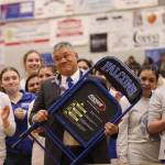 Ben Hohenstatt / Juneau Empire 
TMHS assistant coach Arnold Ibias, who is retiring after 20 years of coaching, holds a chair he was gifted during a ceremony amid senior night celebrations. The chair was given to him in deceptive, appliance-sized packaging, which Ibias said concerned him. The longtime sideline presence said that hes played a lot of jokes over the years, so he wasnt sure what could be in the box. TMHS head coach Andy Lee, who effusively complimented Ibias, said although Ibias doesnt sit much by nature, he has been a vocal critic of the uncomfortable sideline chairs available to coaches. Ibias, who was also given a fishing pole during the ceremony, said the gift is a great gesture.