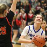 Jonson Kuhn / Juneau Empire 
TMHS sophomore Kerra Baxter (22) takes the ball in for a layup against JDHS on Tuesday night at TMHS. Baxter led both teams in scores for a total of 21 points.